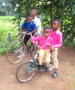 Sierra Leone 2024: schoolkids on bikes